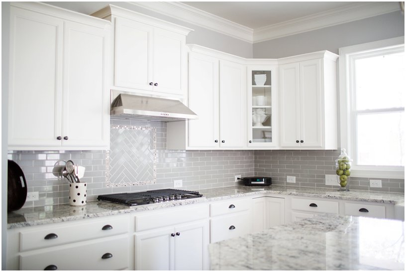 white kitchen cabinets gray back splash 